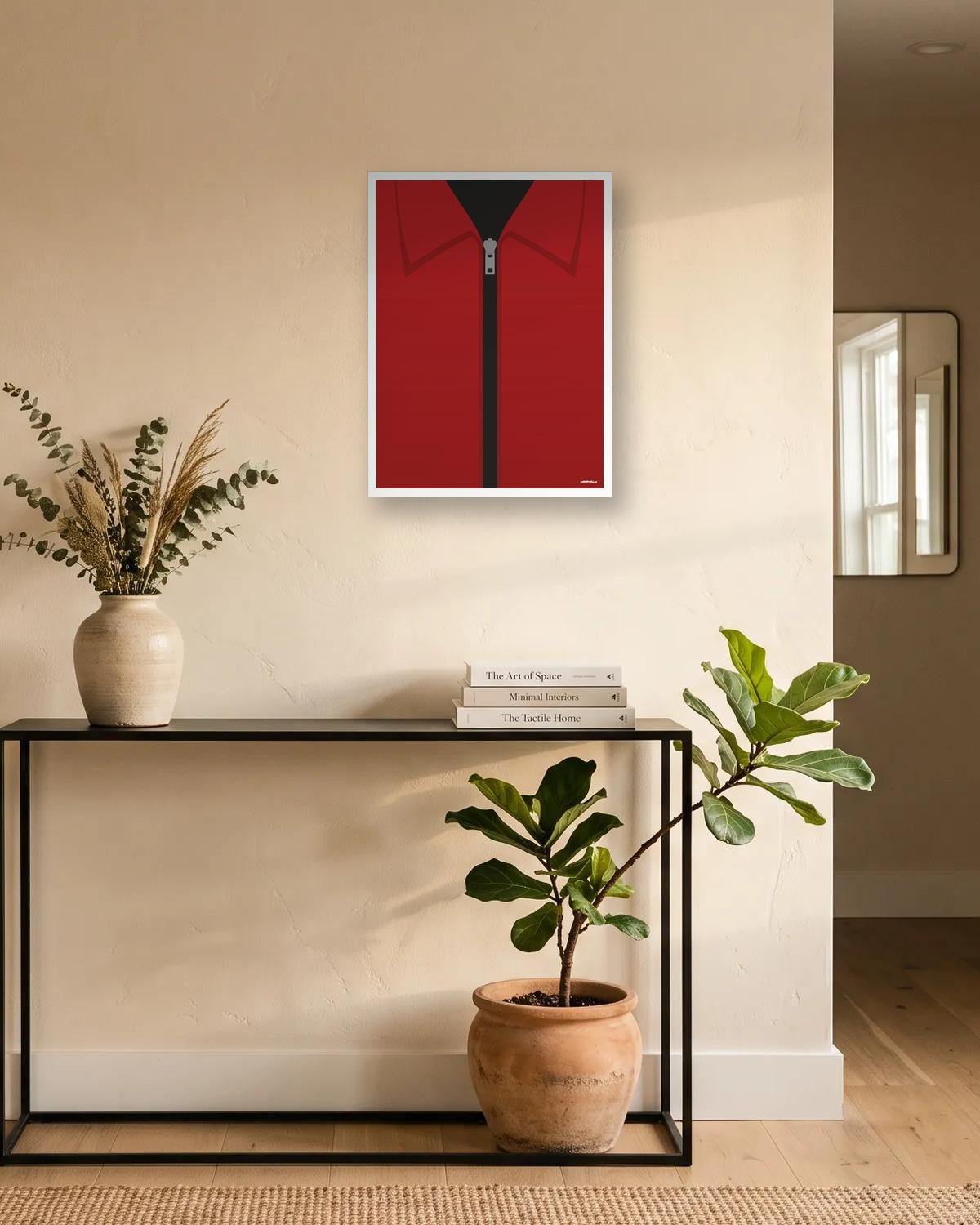 Combinaison rouge, affiche encadrée dans une entrée