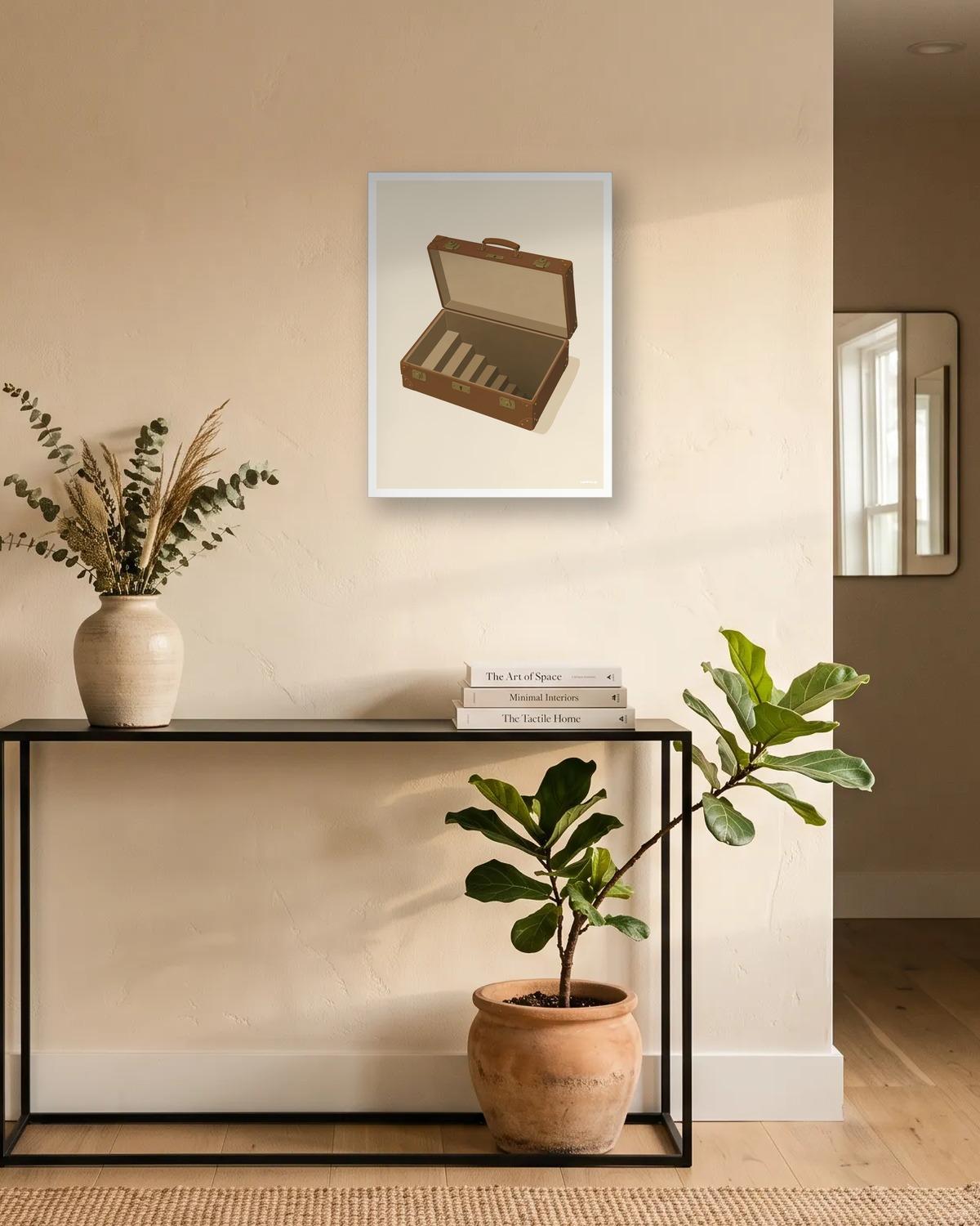 L'escalier dans la valise, affiche encadrée dans une entrée
